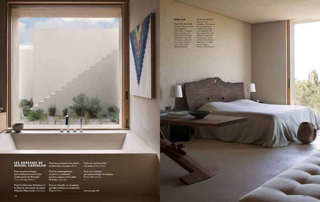 Cote Sud spread with a bathtub by a window and a bedroom