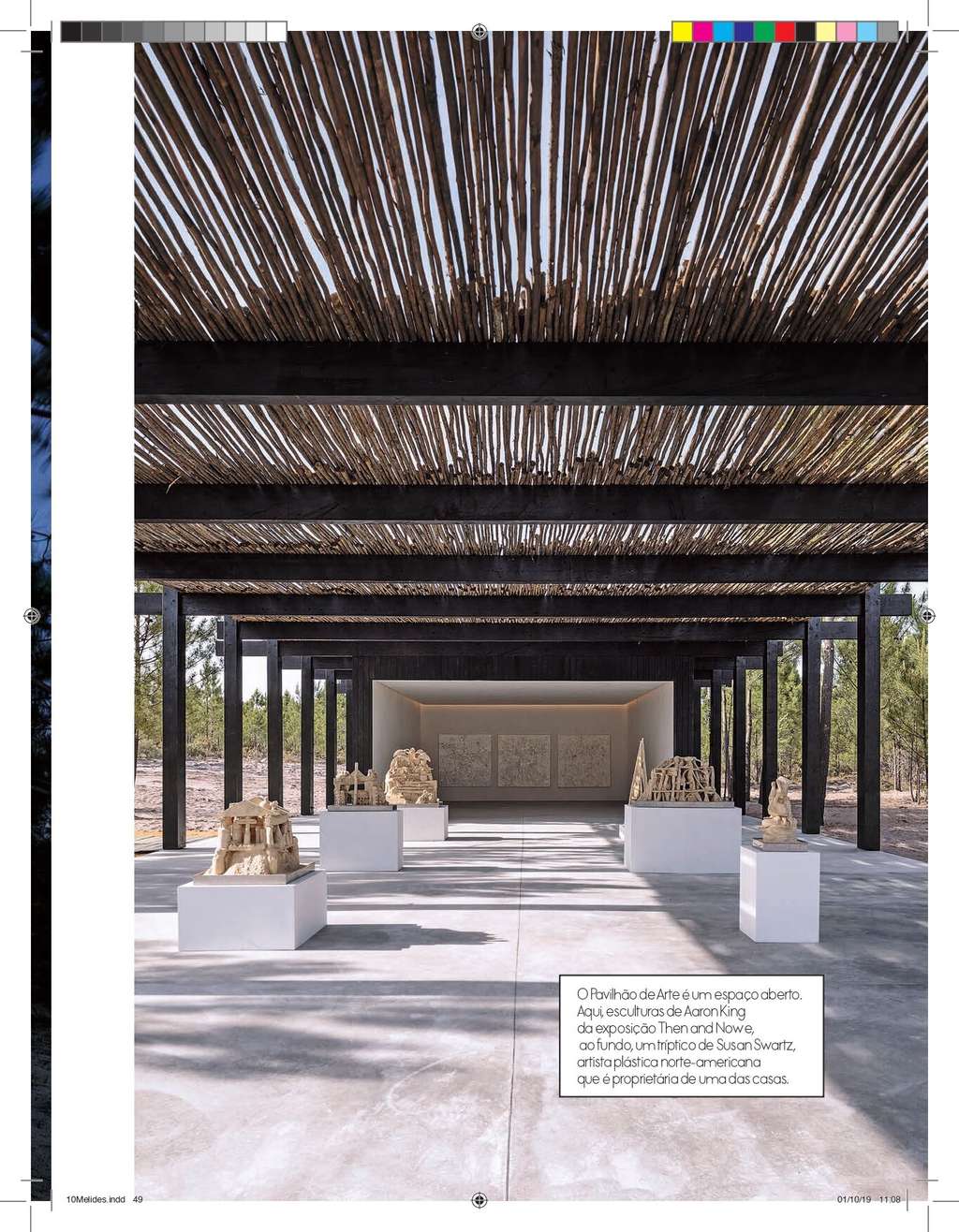 Elle Decoration page with a wooden pergola over an exhibition space with sculptures