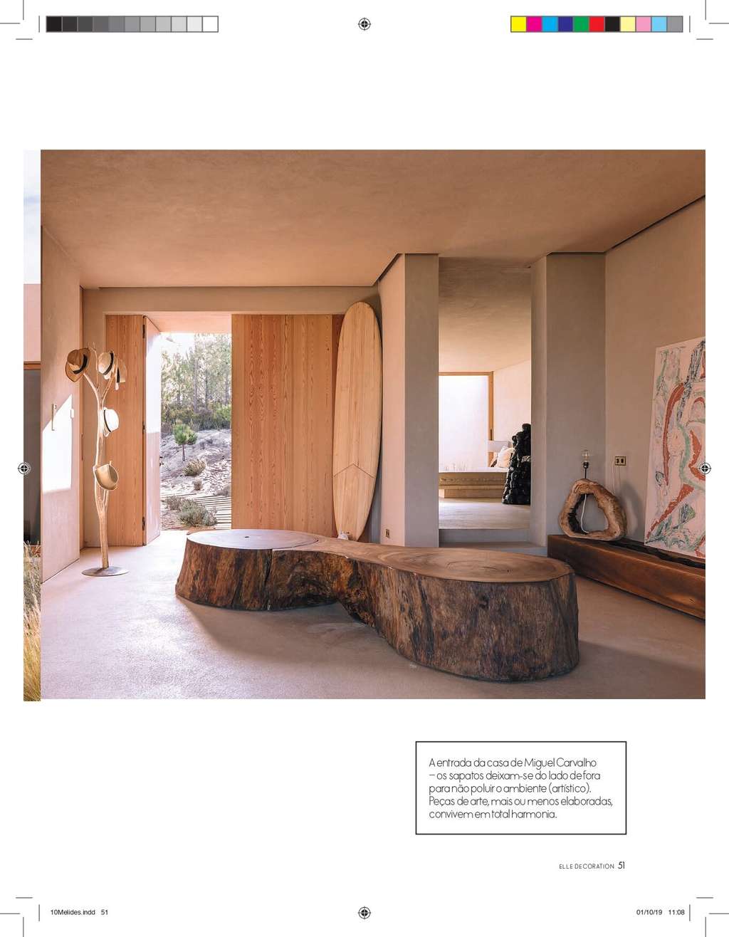 Elle Decoration page with a living room, a tree-trunk bench and a wooden door