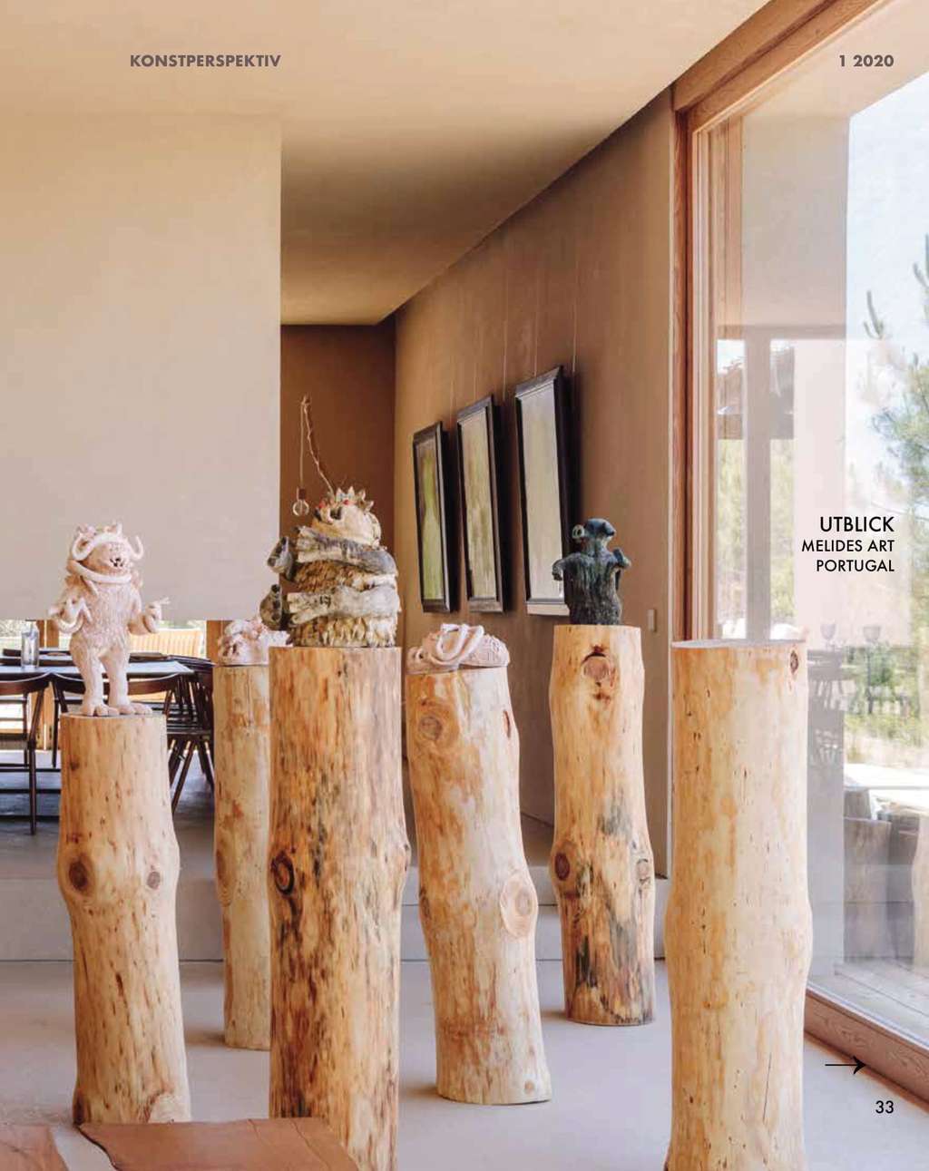 Konstutopi article page with ceramic sculptures on wooden pedestals in a dining room