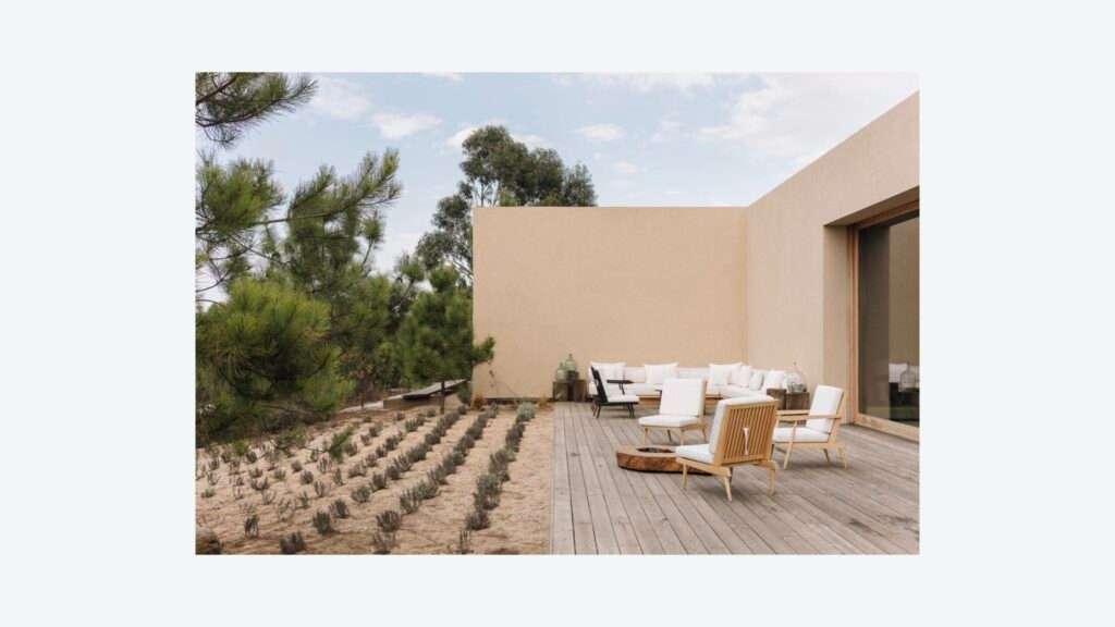 Visual Pleasure page with a terrace of white sofas on a wooden deck