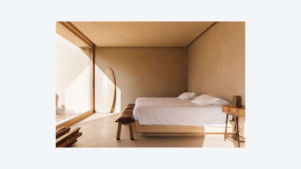 Visual Pleasure page with a bedroom with white linens and a large window