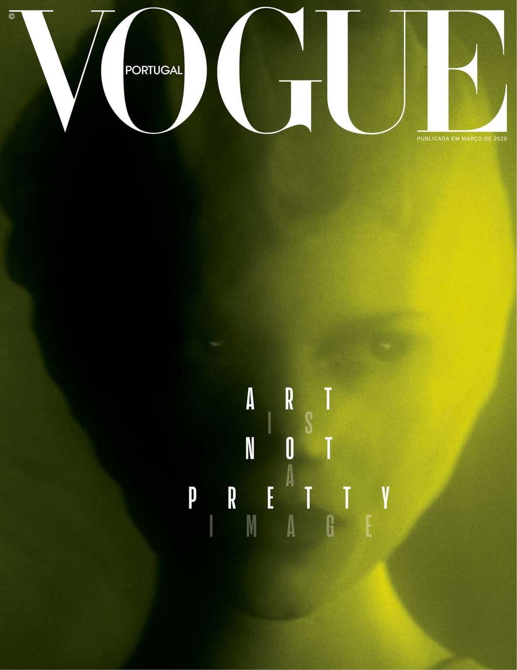 Vogue Portugal cover, glowing green portrait with the words Art is not a pretty image
